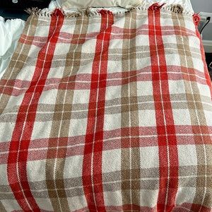 Orange,white and beige throw blanket